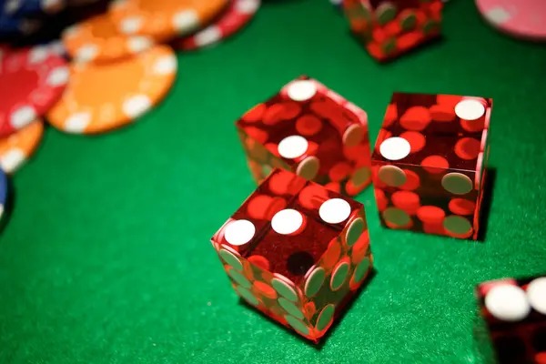 Live dealer dealing Teen Patti cards to multiple players